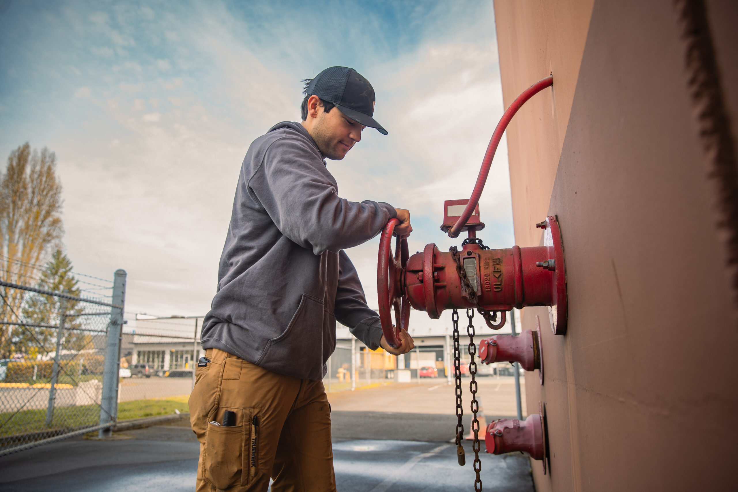 technician working on fire sprinkler valve
